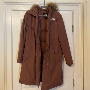 North Face arctic parka. Size Medium, light maroon color